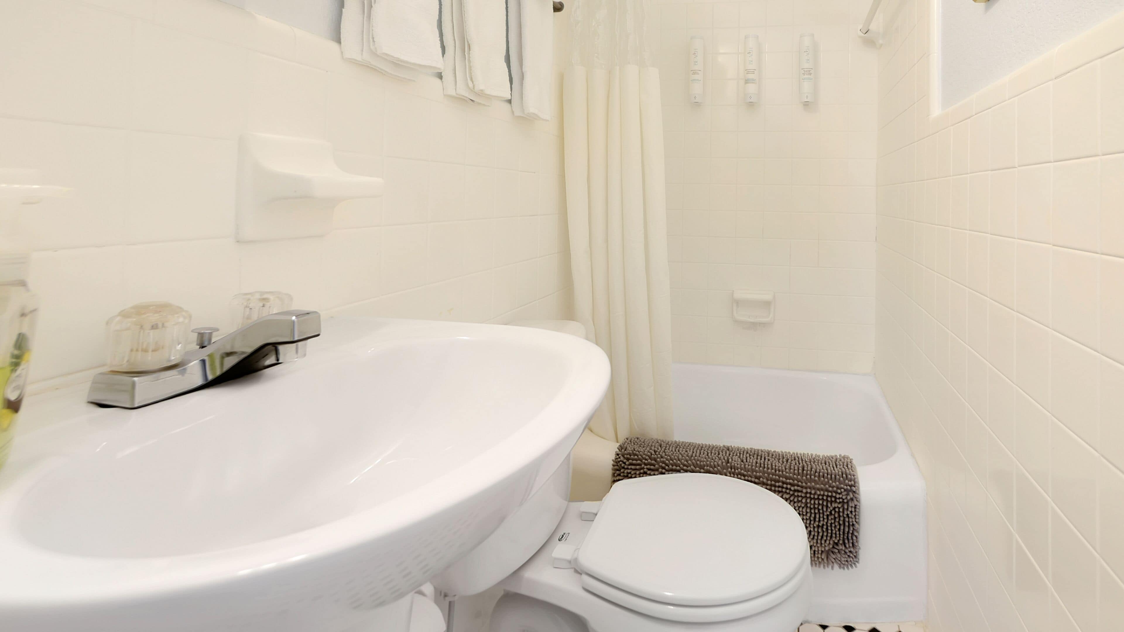 #5 gulfview studio | bathroom | designer toiletries, hair dryer, towels, soap