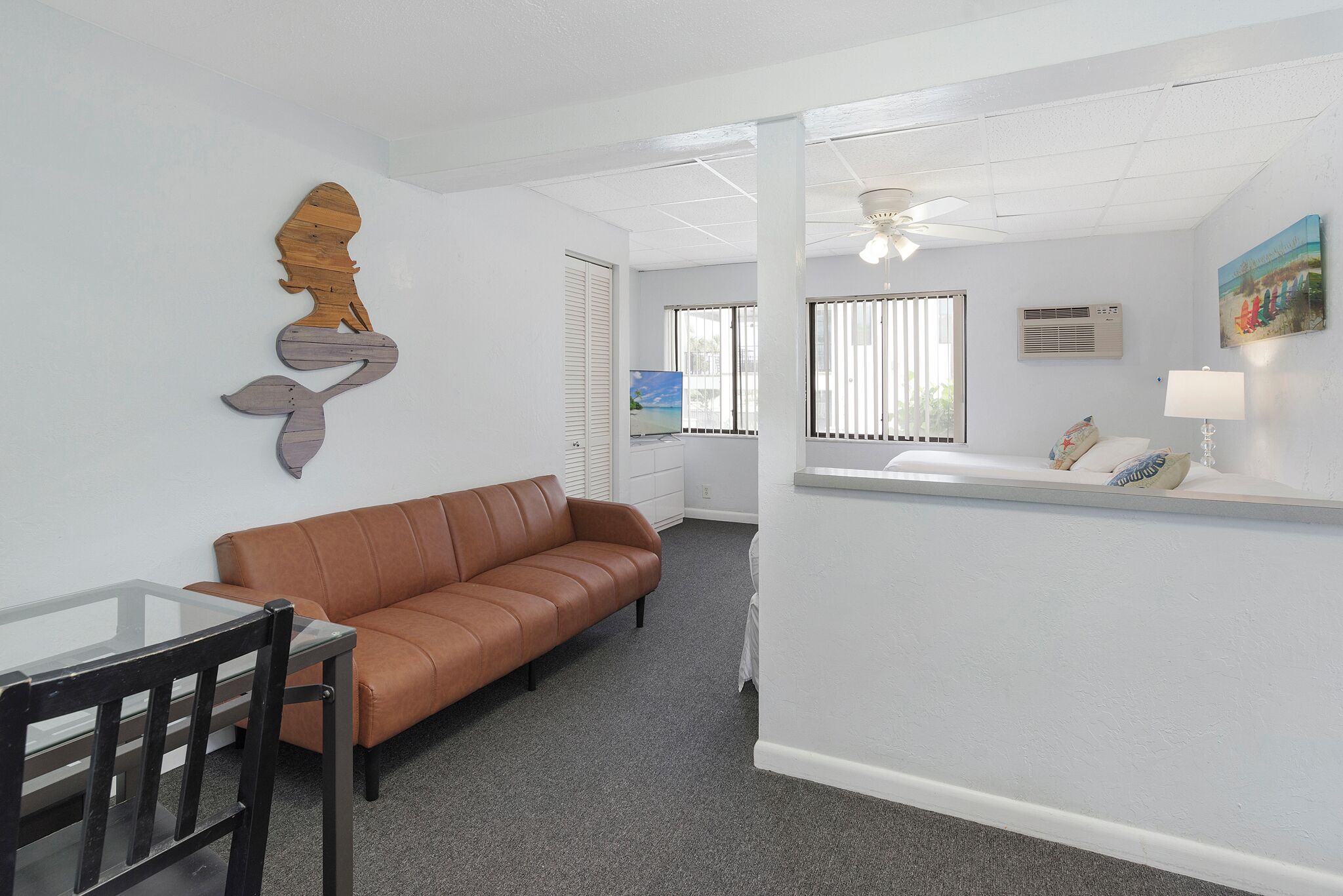 family studio suite, multiple beds, patio, partial ocean view | living area | 32-inch flat-screen tv with digital channels, tv