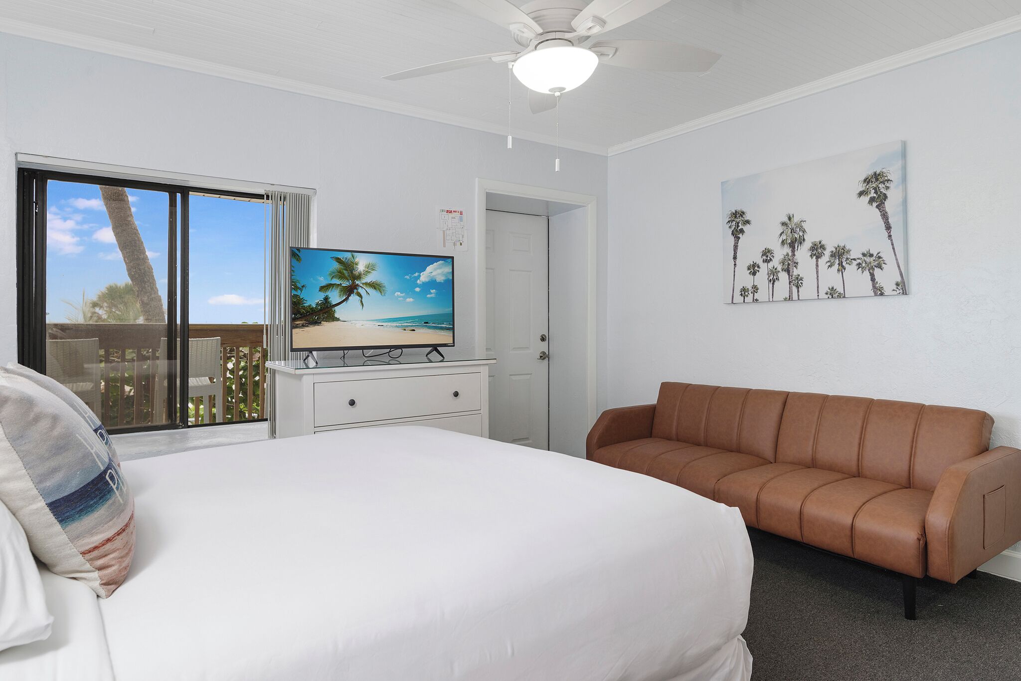 deluxe studio, multiple beds, ocean view | living area | 32-inch flat-screen tv with digital channels, tv