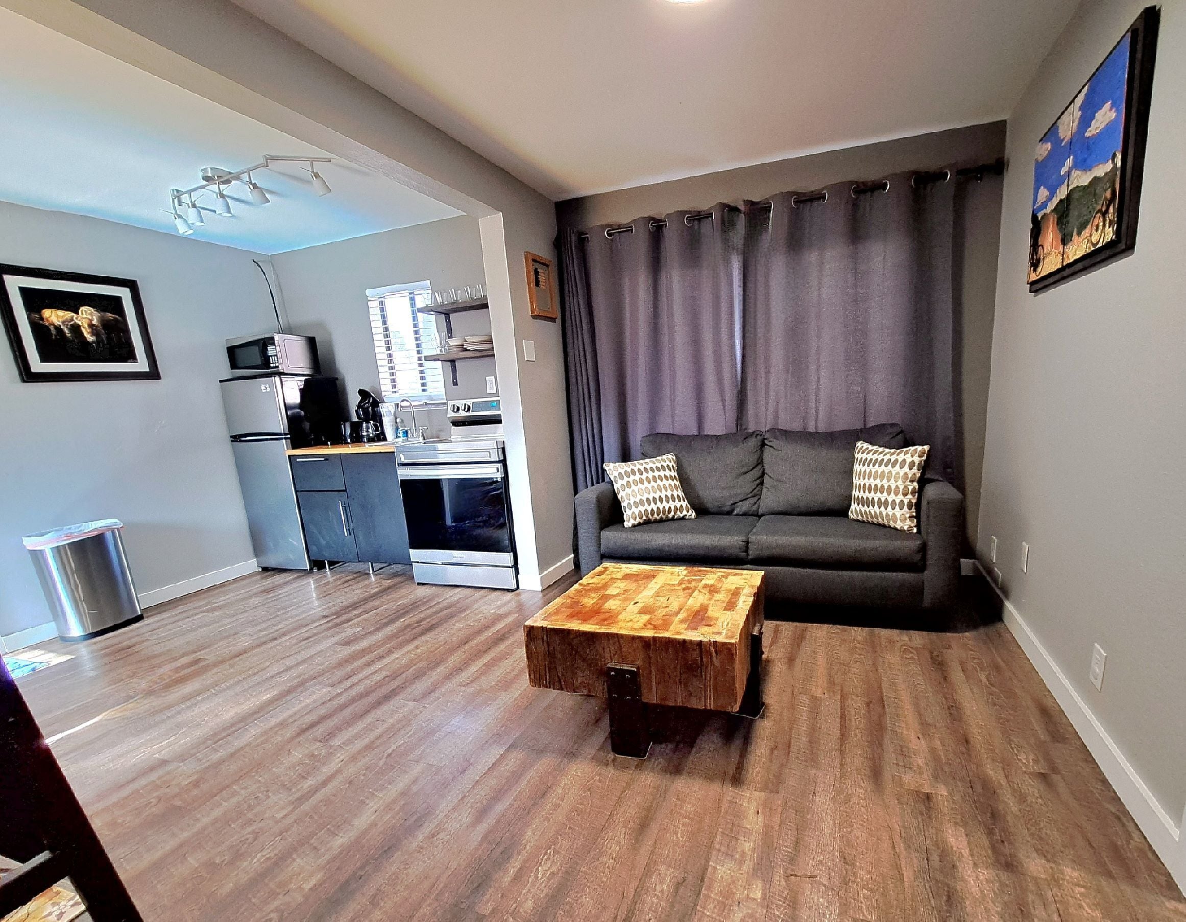 signature cottage | living area | 32-inch tv with cable channels, ping pong