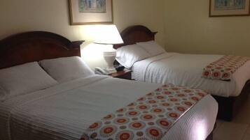 Standard Room, 2 Queen Beds | Pillowtop beds, in-room safe, desk, free WiFi