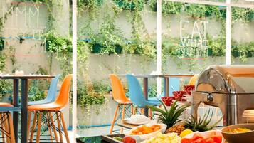 Breakfast, lunch, dinner served; international cuisine