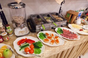 Daily buffet breakfast (USD 10 per person)