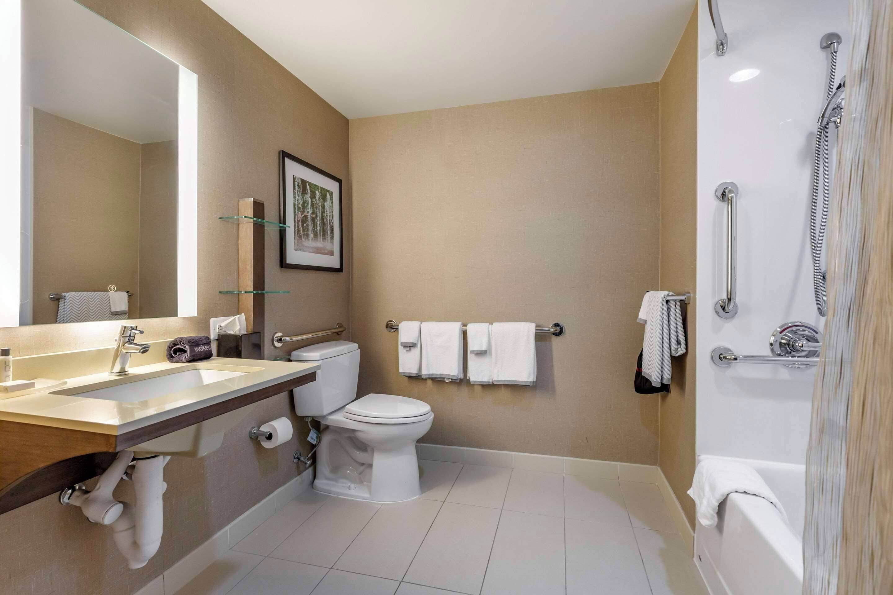 desk, laptop workspace, blackout curtains, iron/ironing board