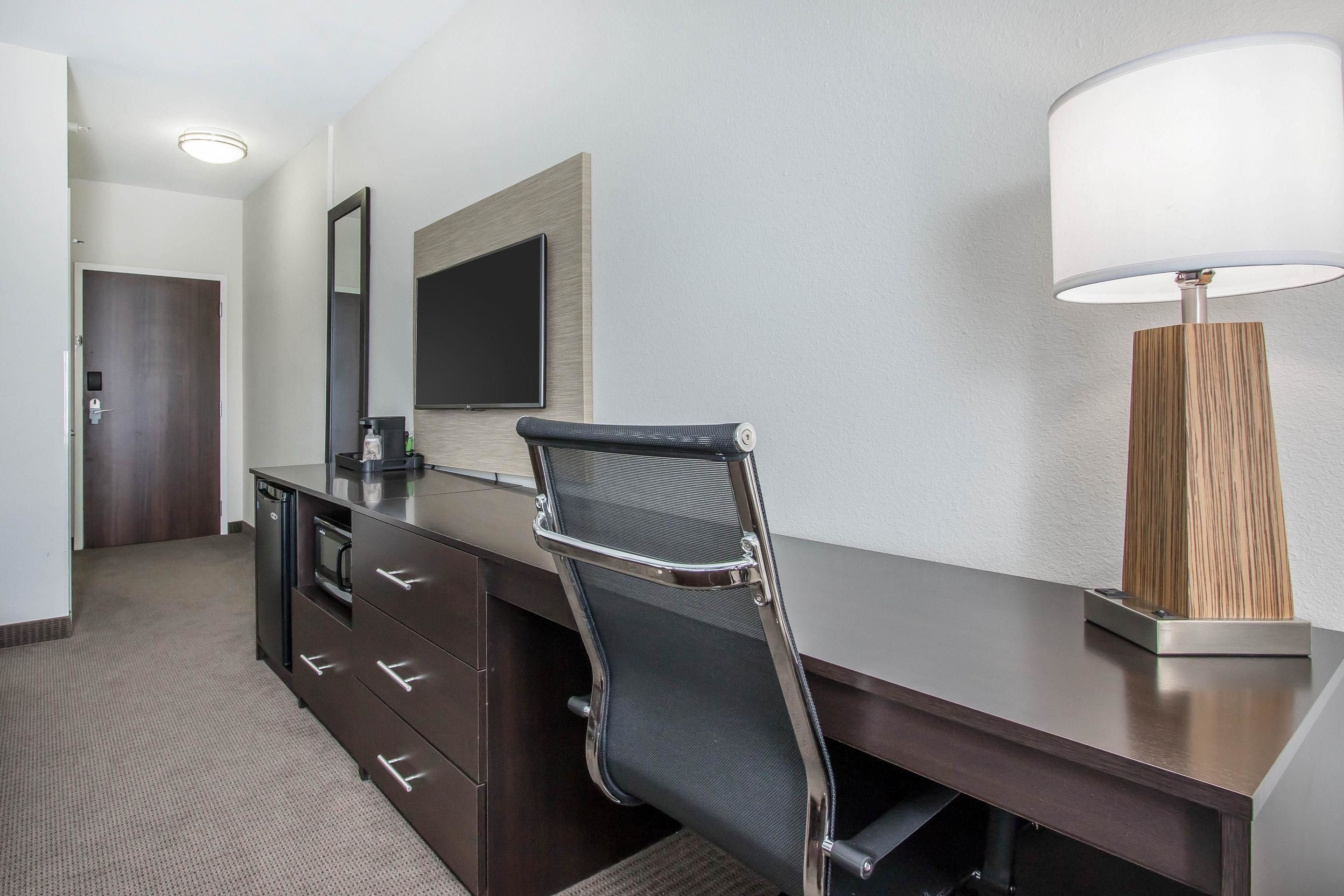 desk, blackout curtains, iron/ironing board, free cots/infant beds