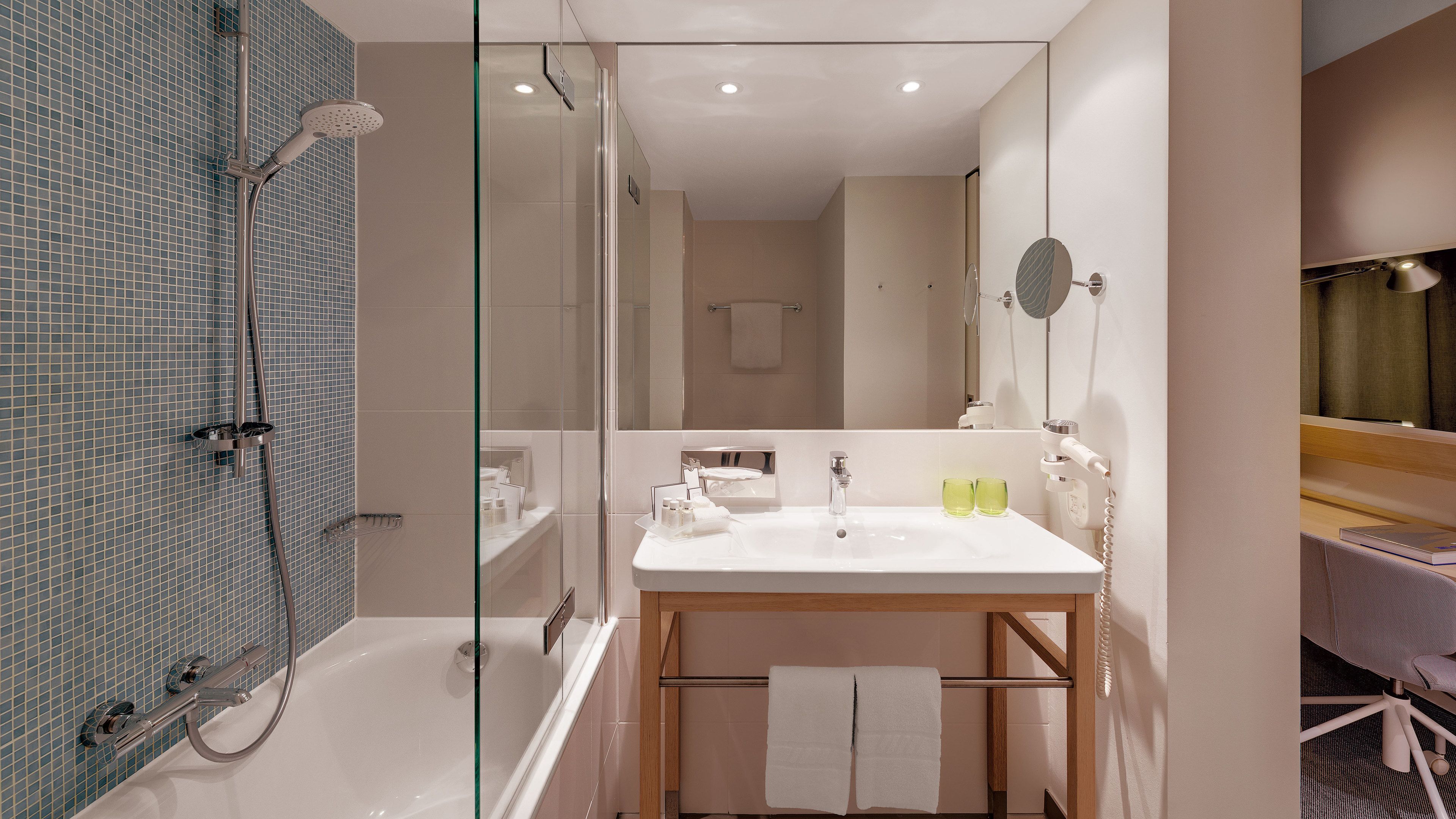 eco-friendly toiletries, hair dryer, towels