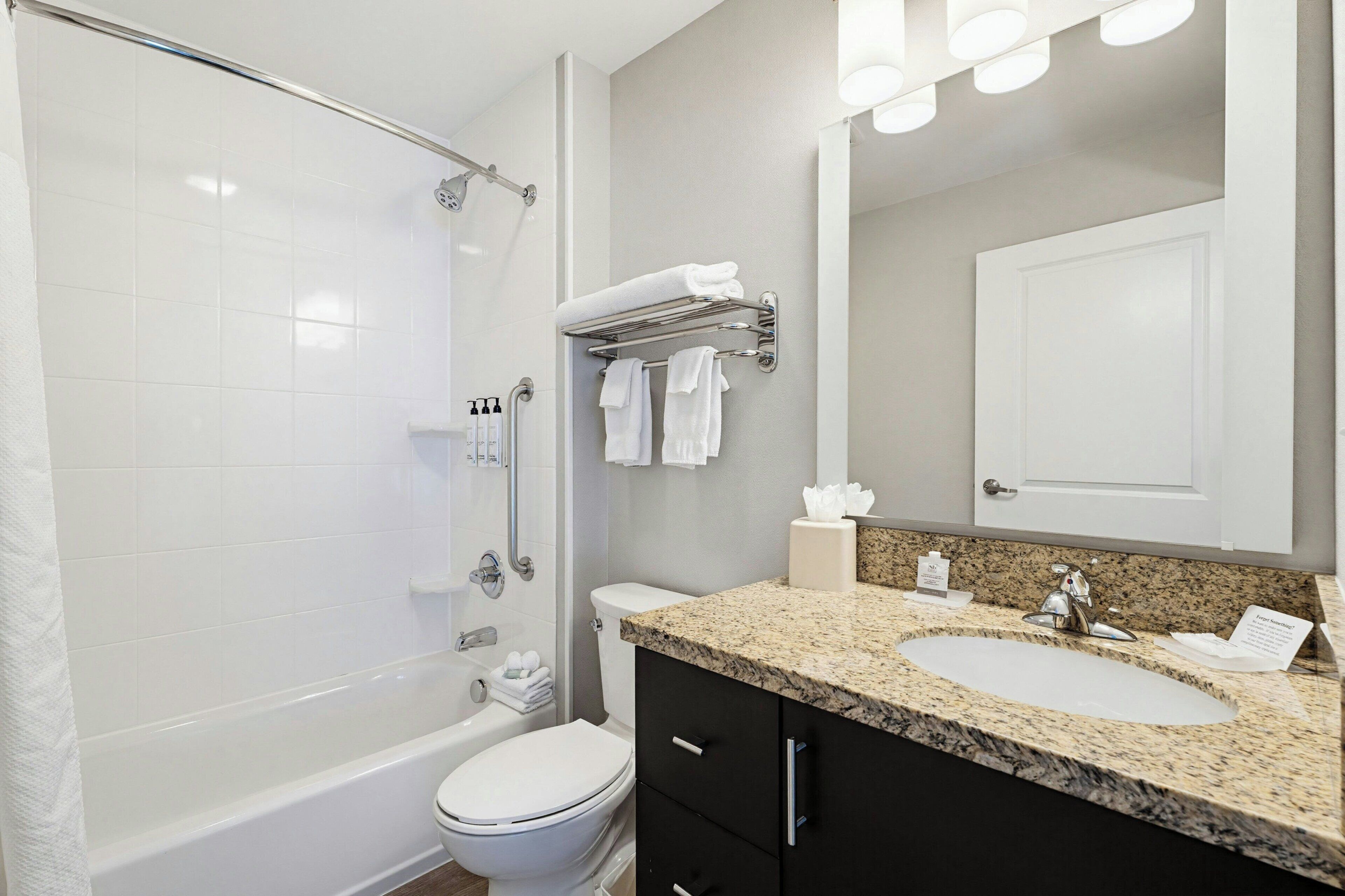 Combined shower/bathtub, hair dryer, towels