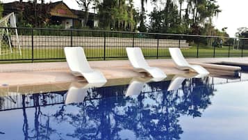 Outdoor pool, open 8:00 AM to 8:00 PM, sun loungers