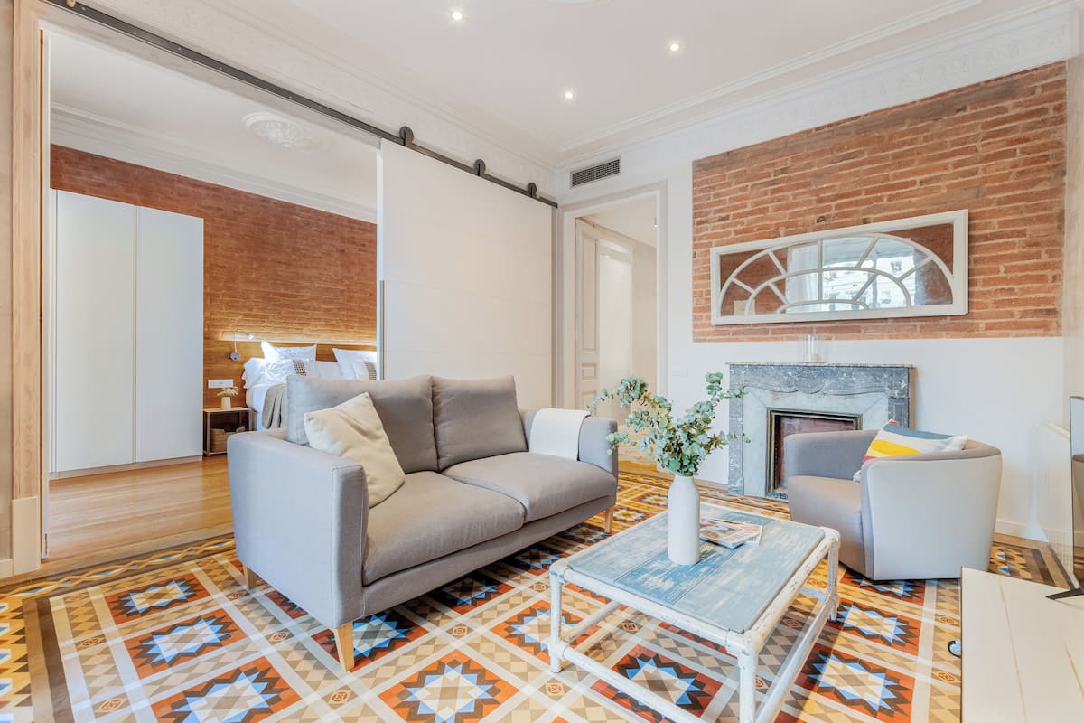Design Apartment | Living area | Flat-screen TV, MP3 dock