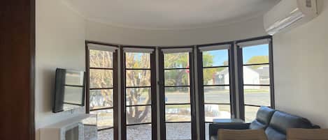 Comfort Apartment, 3 Bedrooms | Living area | Plasma TV, DVD player