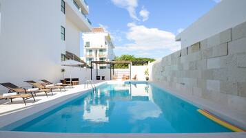 Outdoor pool, sun loungers