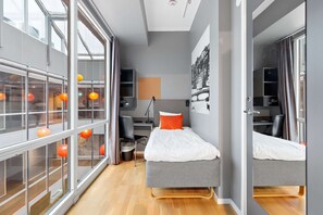 Economy Room, 1 Twin Bed, Non Smoking, No Windows | Pillowtop beds, in-room safe, desk, cribs/infant beds