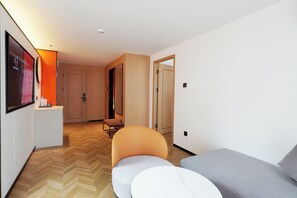 Standard Suite, 1 Bedroom | Living area | 52-inch Smart TV with cable channels - L-Seven Hotel (Bangkok)