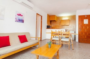 Apartment, 2 Bedrooms, Balcony, City View | Living room | 30-cm flat-screen TV with cable channels, TV - Apartamentos Puet (Sant Antoni de Portmany)