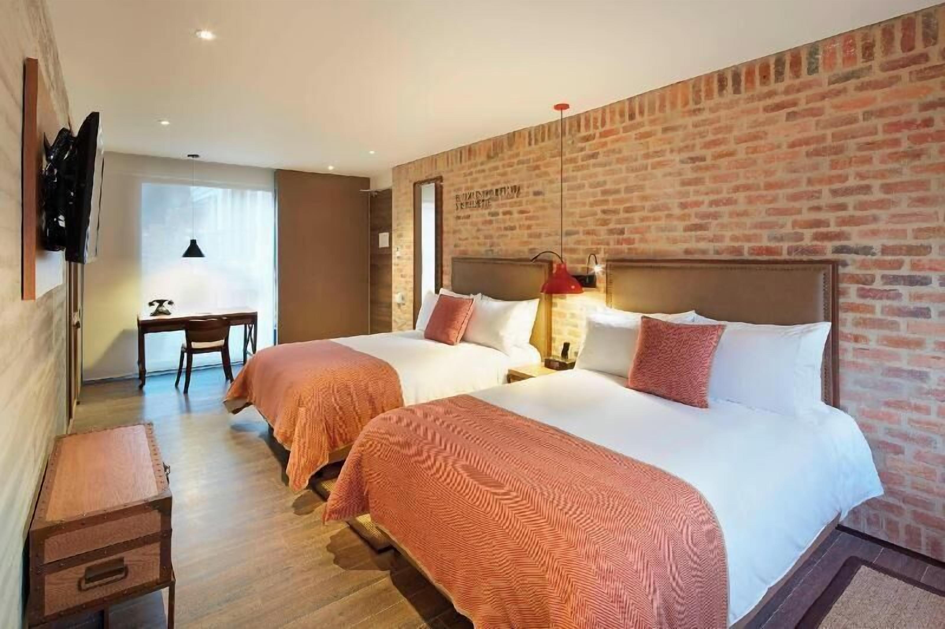 Biancheria da letto di alta qualità, materassi a doppio strato, minibar