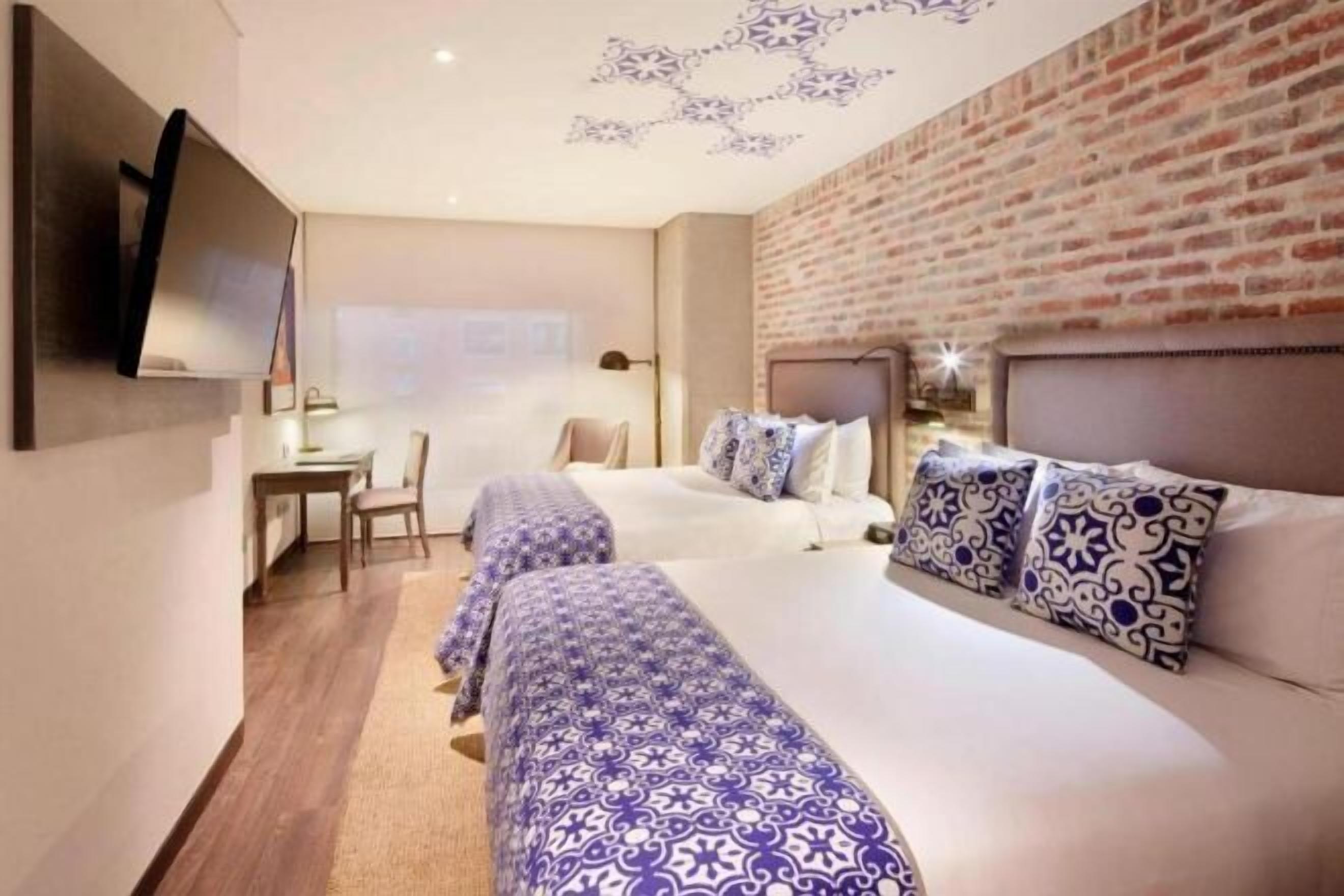 Premium bedding, pillow-top beds, minibar, in-room safe