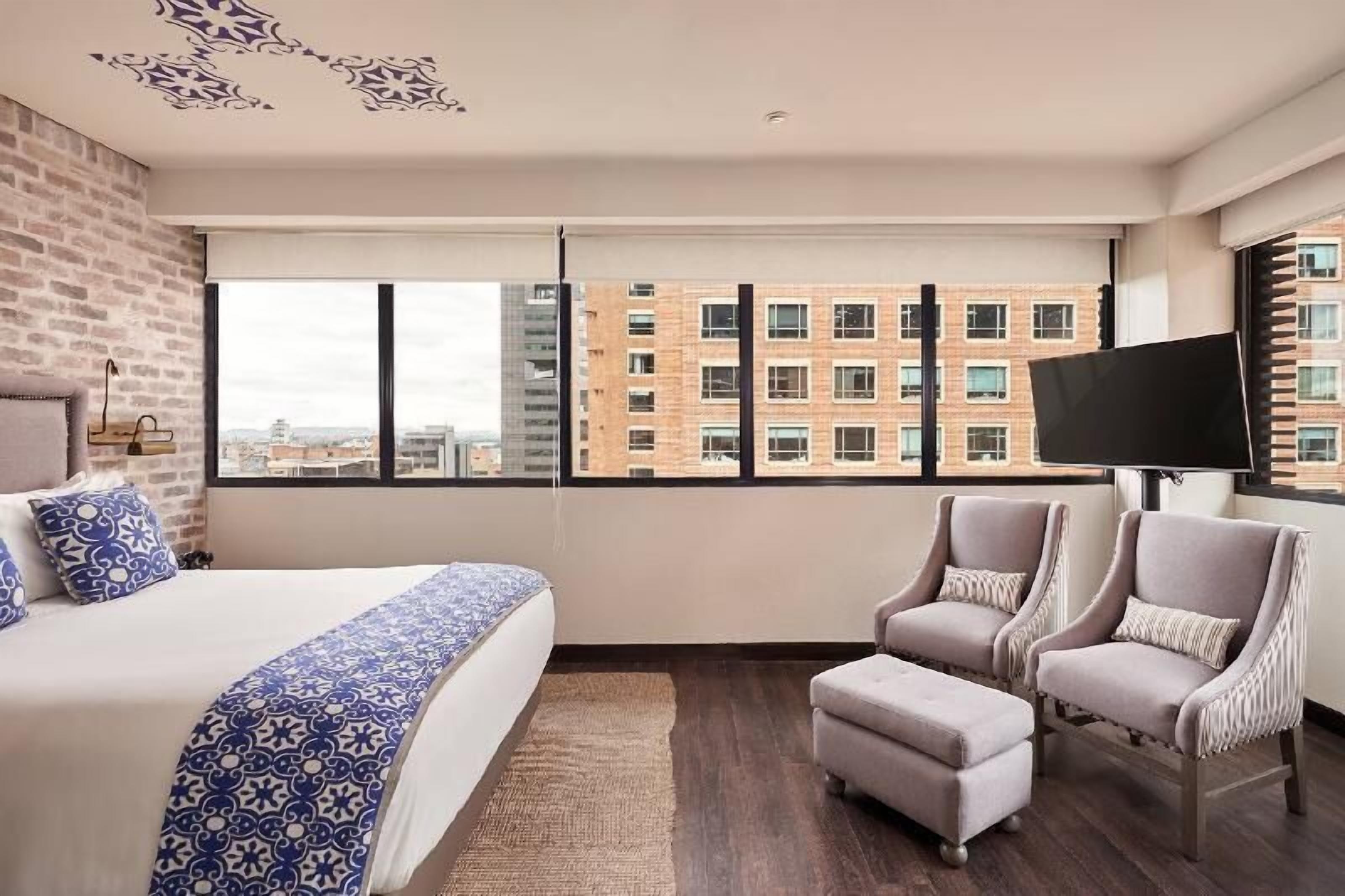 Biancheria da letto di alta qualità, materassi a doppio strato, minibar