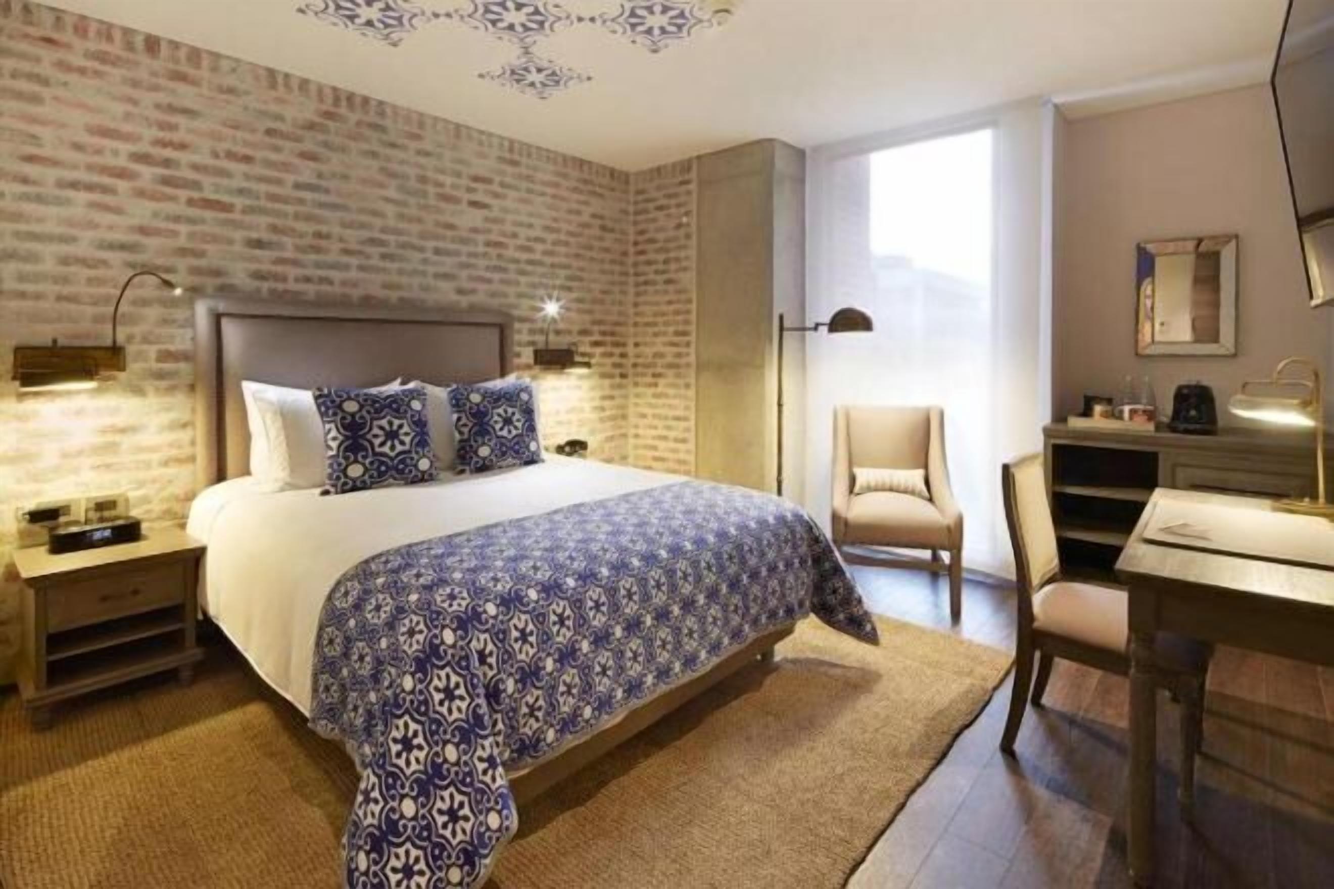 Premium bedding, pillow-top beds, minibar, in-room safe