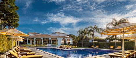 Outdoor pool, pool umbrellas, pool loungers