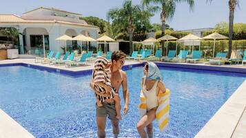Outdoor pool, pool umbrellas, pool loungers