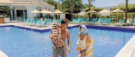 Outdoor pool, pool umbrellas, pool loungers