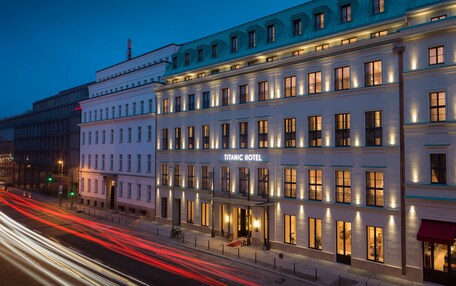 A multi-story building with a prominent sign reading "Titanic Hotel."