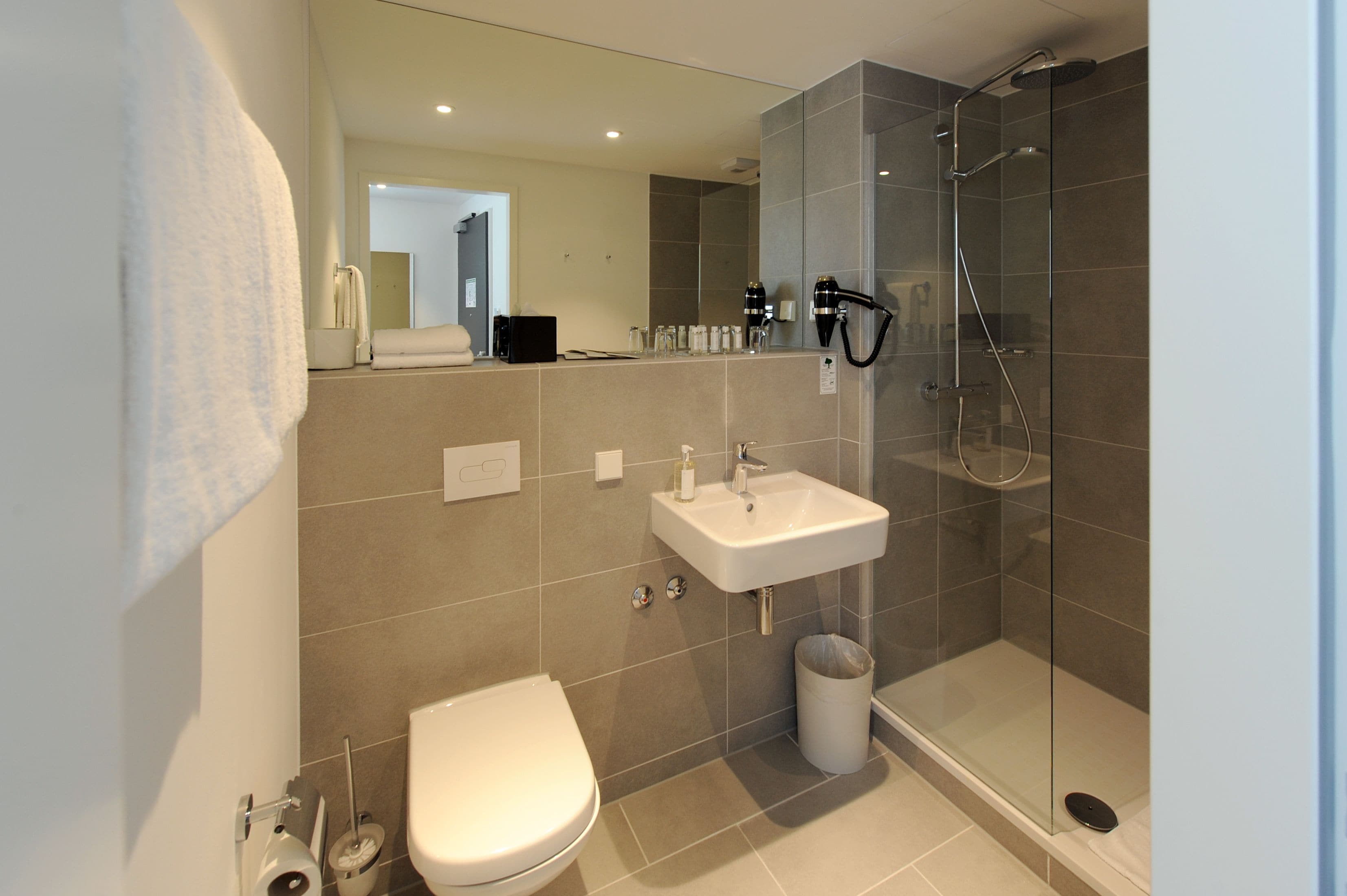 shower, rainfall showerhead, designer toiletries, hair dryer