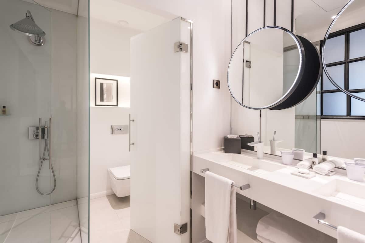 eco-friendly toiletries, hair dryer, bathrobes, slippers