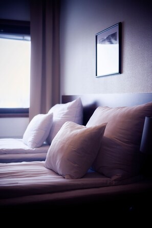 Cortinas blackout, wifi gratis y ropa de cama 