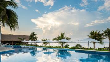 Outdoor pool, open 8:00 AM to 8:00 PM, sun loungers