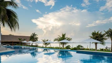 Outdoor pool, open 8:00 AM to 8:00 PM, sun loungers