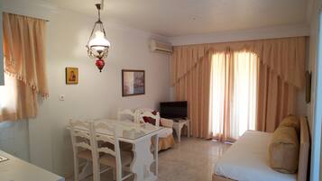 Apartment, 1 Bedroom | Premium bedding, in-room safe, iron/ironing board, free WiFi