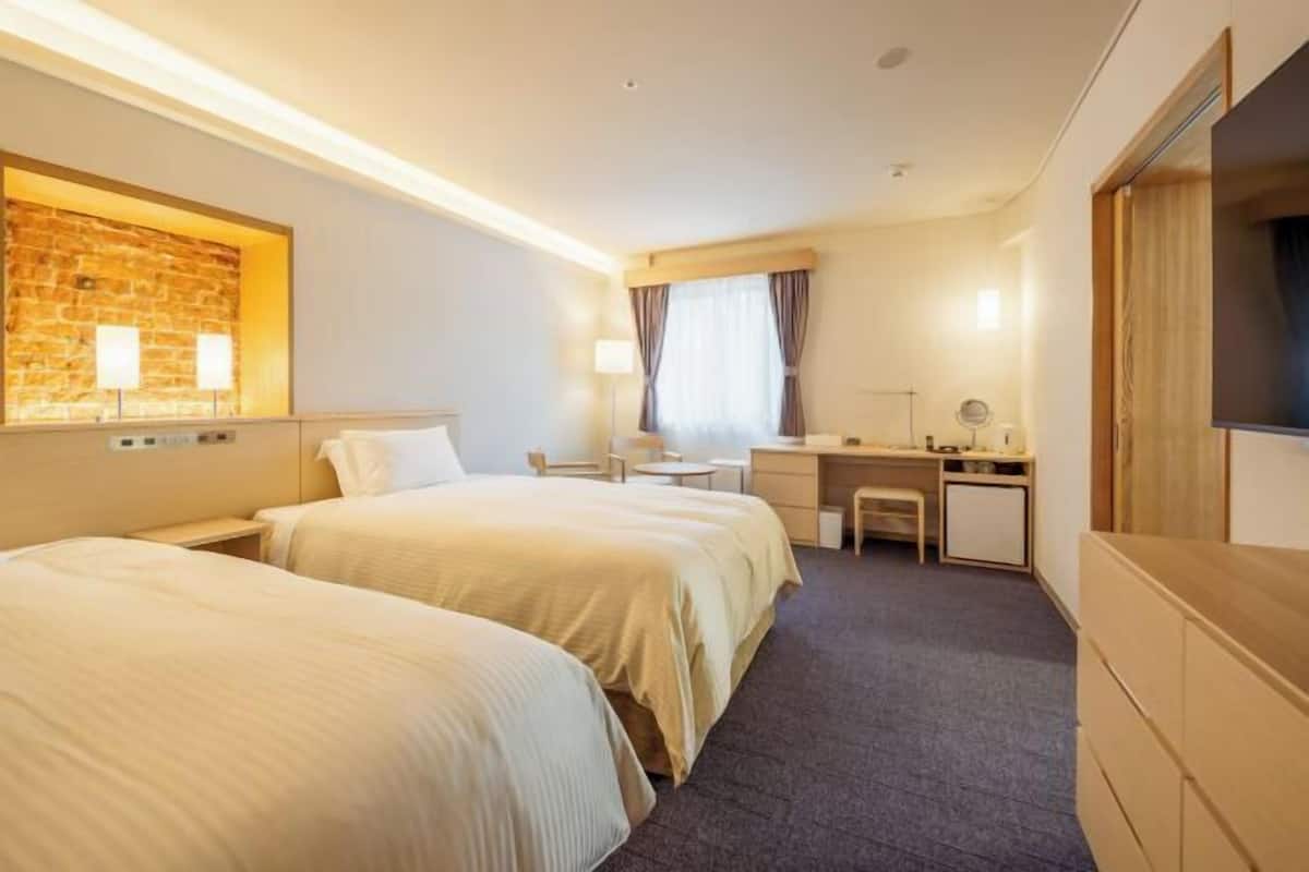 1 slaapkamer, een kluis op de kamer, een bureau, een laptopwerkplek