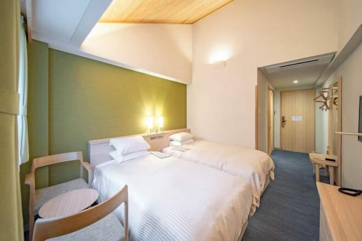 1 slaapkamer, een kluis op de kamer, een bureau, een laptopwerkplek