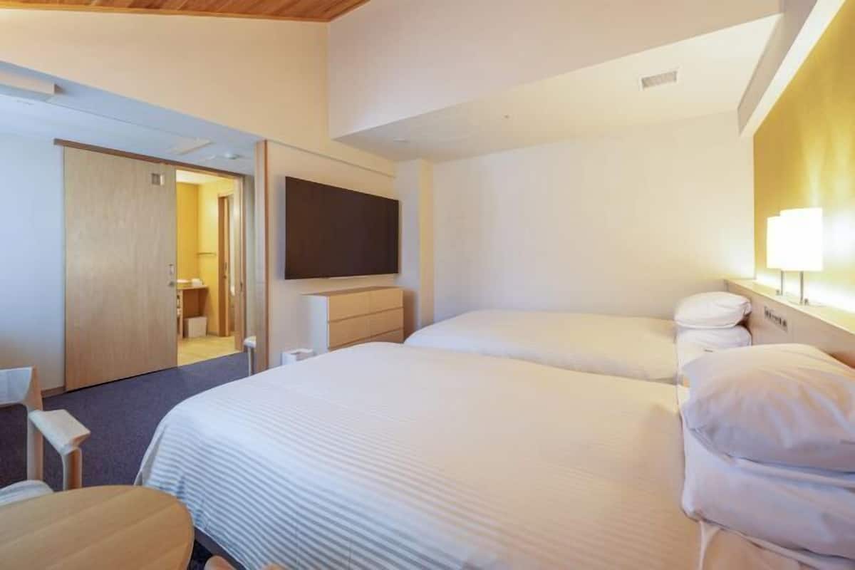 1 slaapkamer, een kluis op de kamer, een bureau, een laptopwerkplek