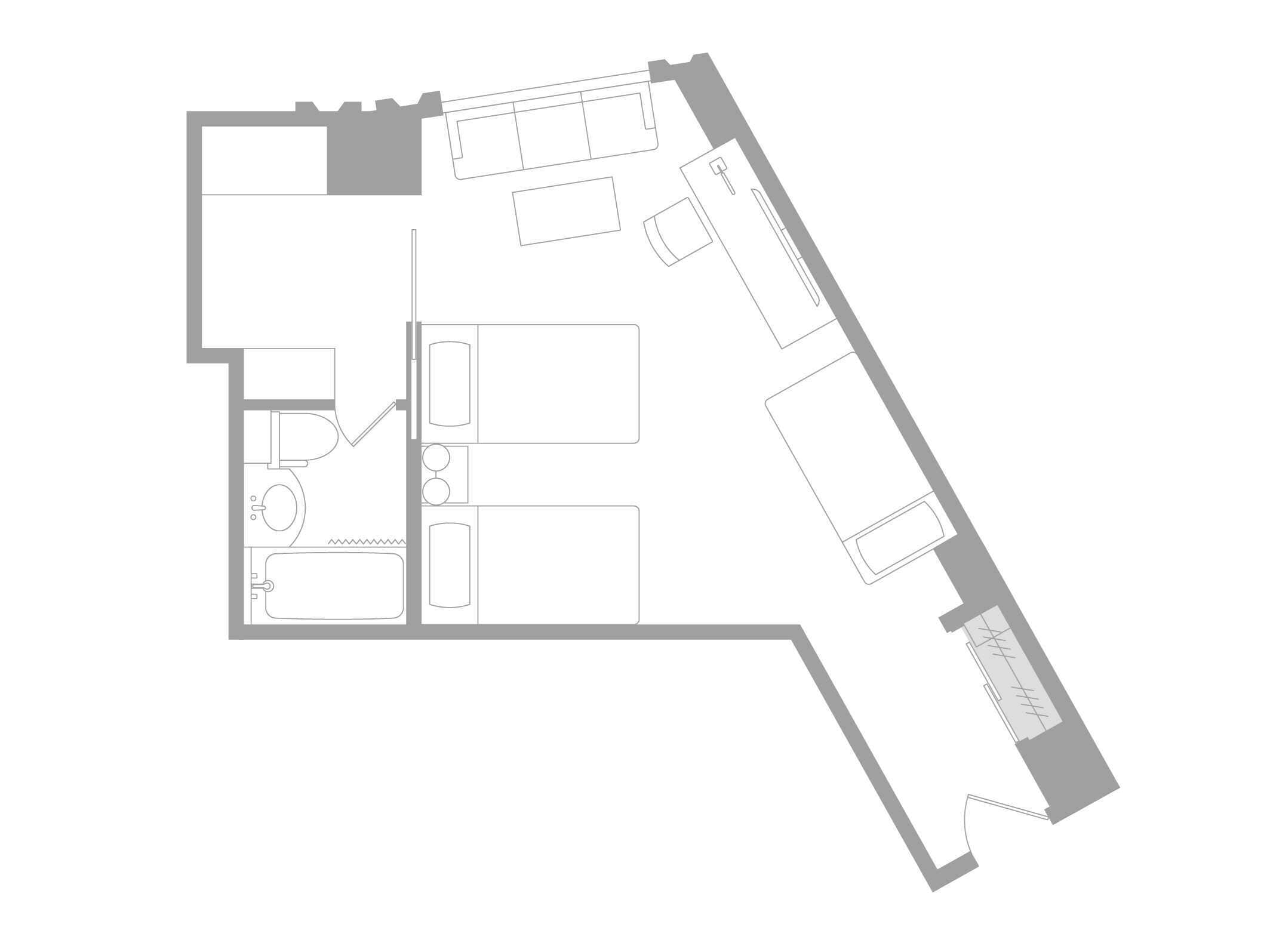 Plano de planta de un hotel con varias habitaciones, una cocina y un baño.