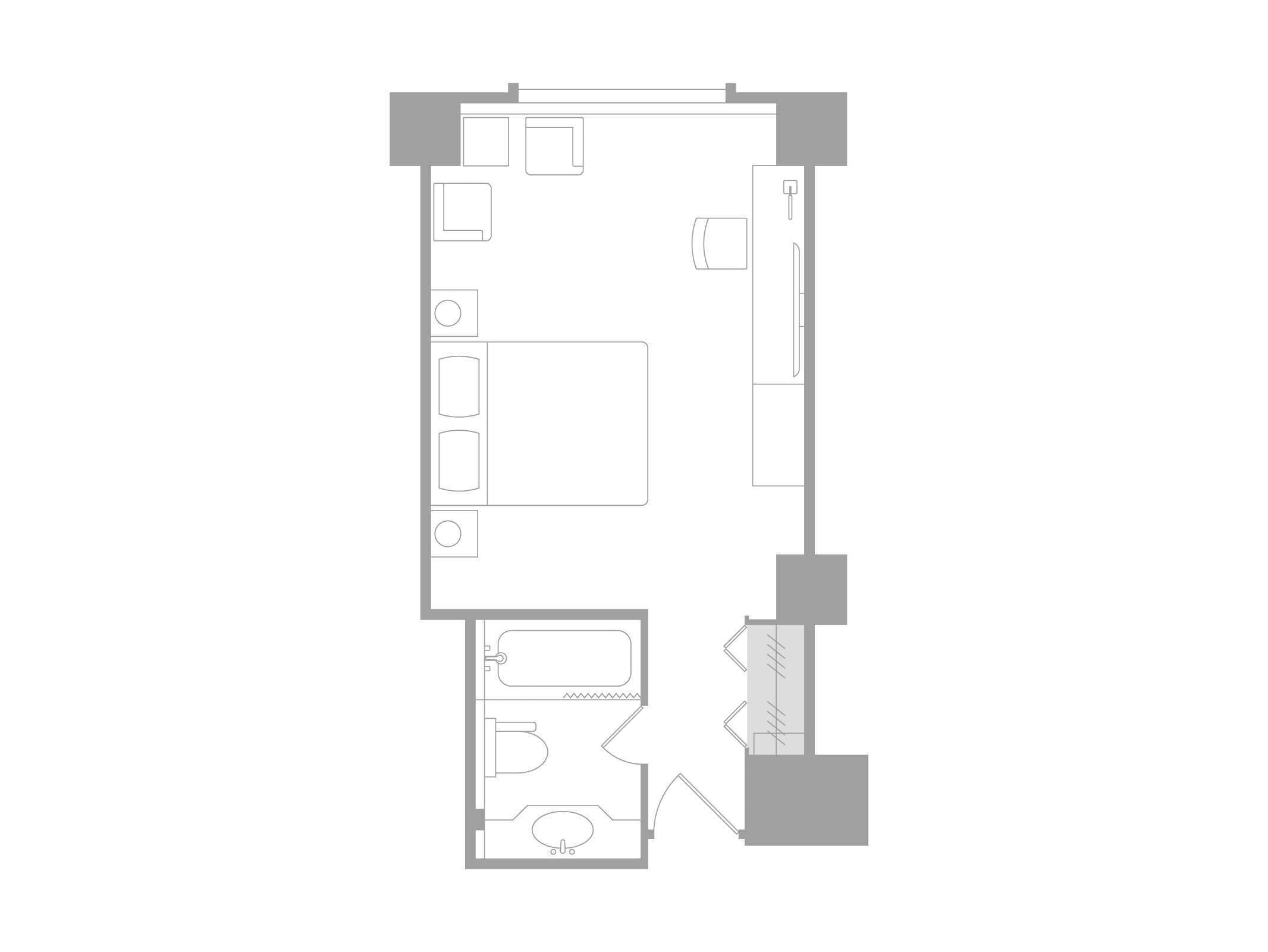 A floor plan of a hotel room with a bathroom, a kitchenette, and a seating area.