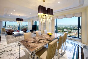 Designer Suite, Club Lounge Access, Free Minibar, City or River View | Living area | 48-inch LED TV with cable channels, TV