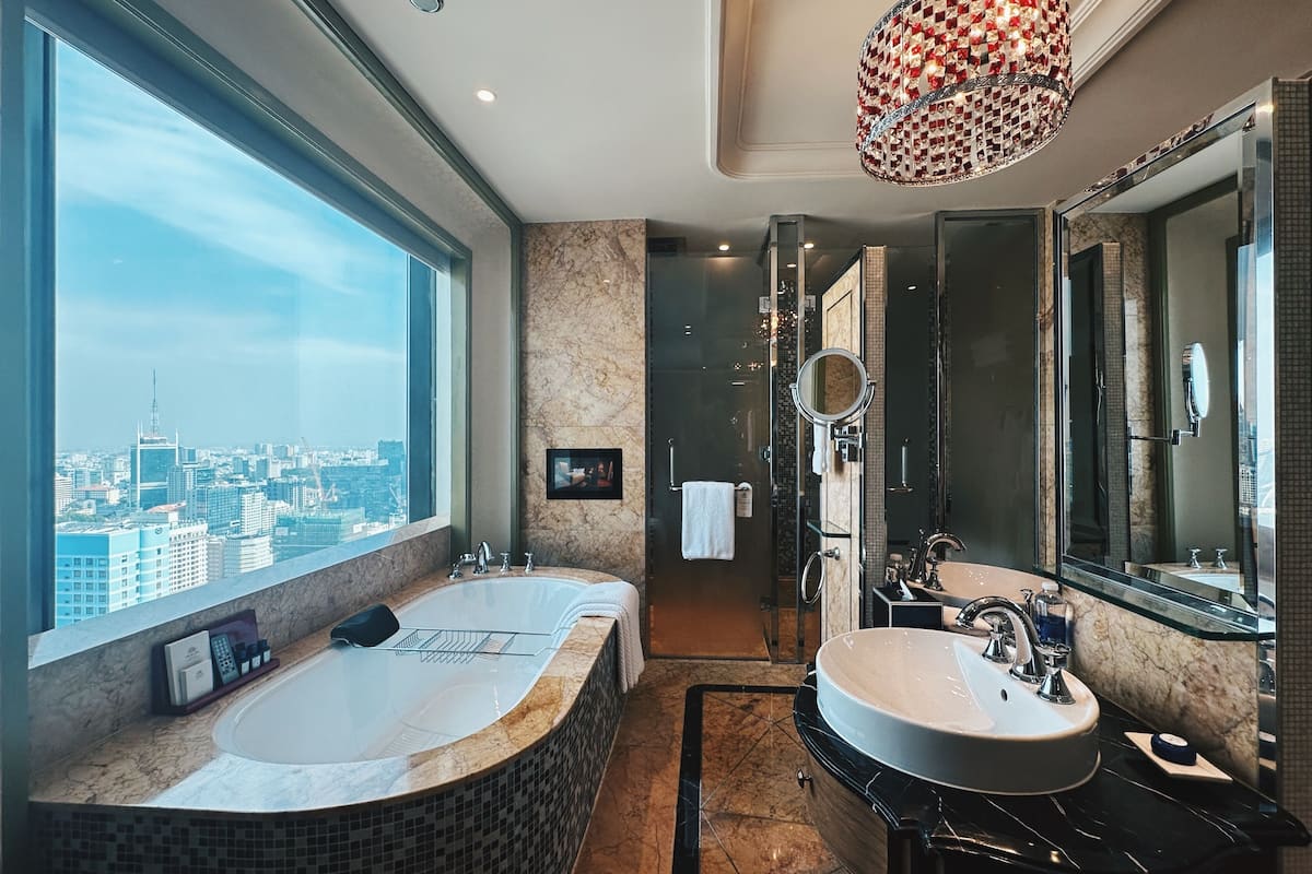 panorama deluxe king free minibar, panoramic view | bathroom | separate bathtub and shower, deep-soaking bathtub, rainfall showerhead