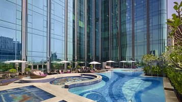 Outdoor pool, open 6:00 AM to 10:00 PM, pool umbrellas, sun loungers