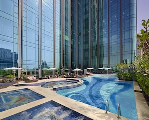 Outdoor pool, open 6:00 AM to 10:00 PM, pool umbrellas, sun loungers