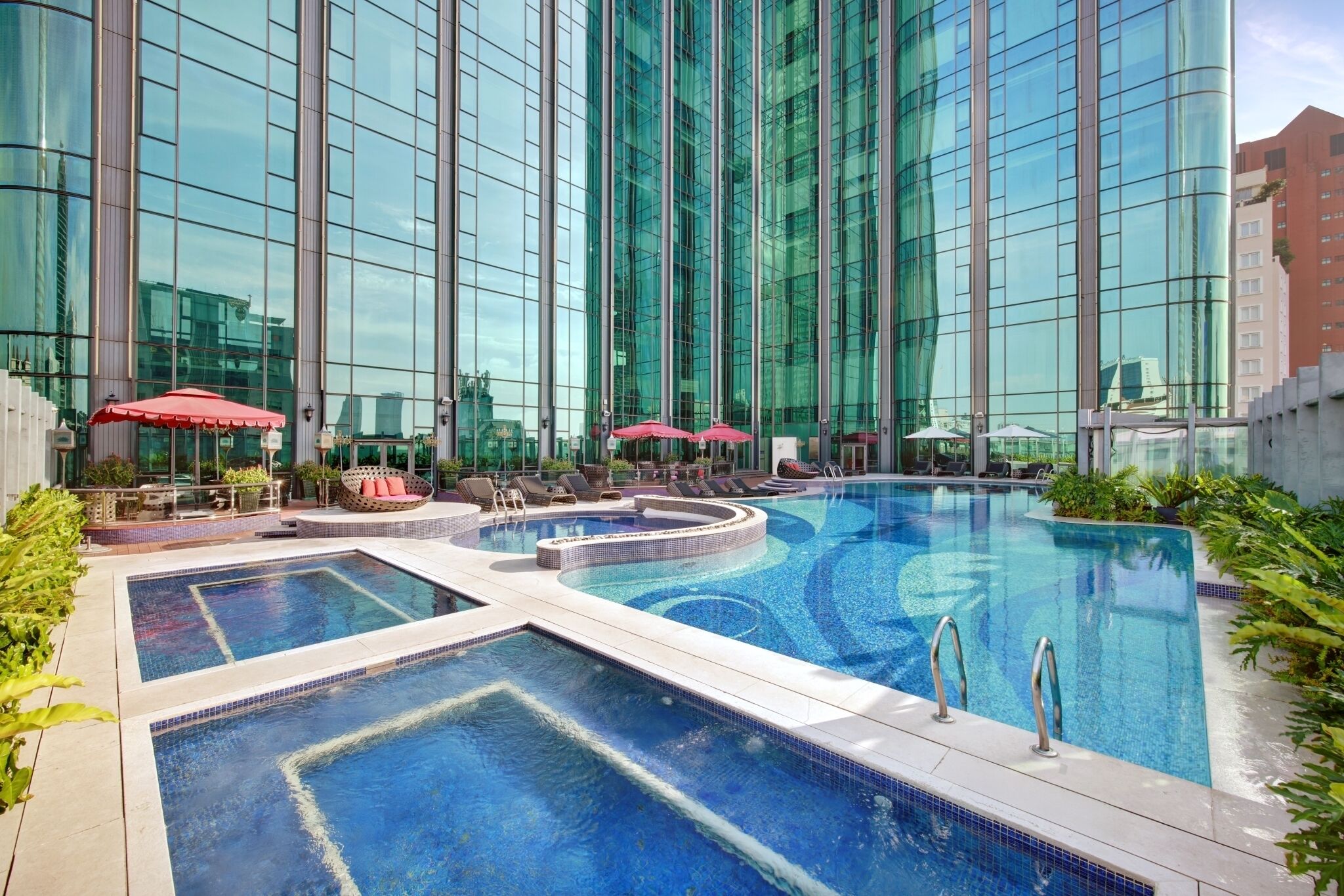 Outdoor pool, open 6:00 AM to 10:00 PM, pool umbrellas, sun loungers