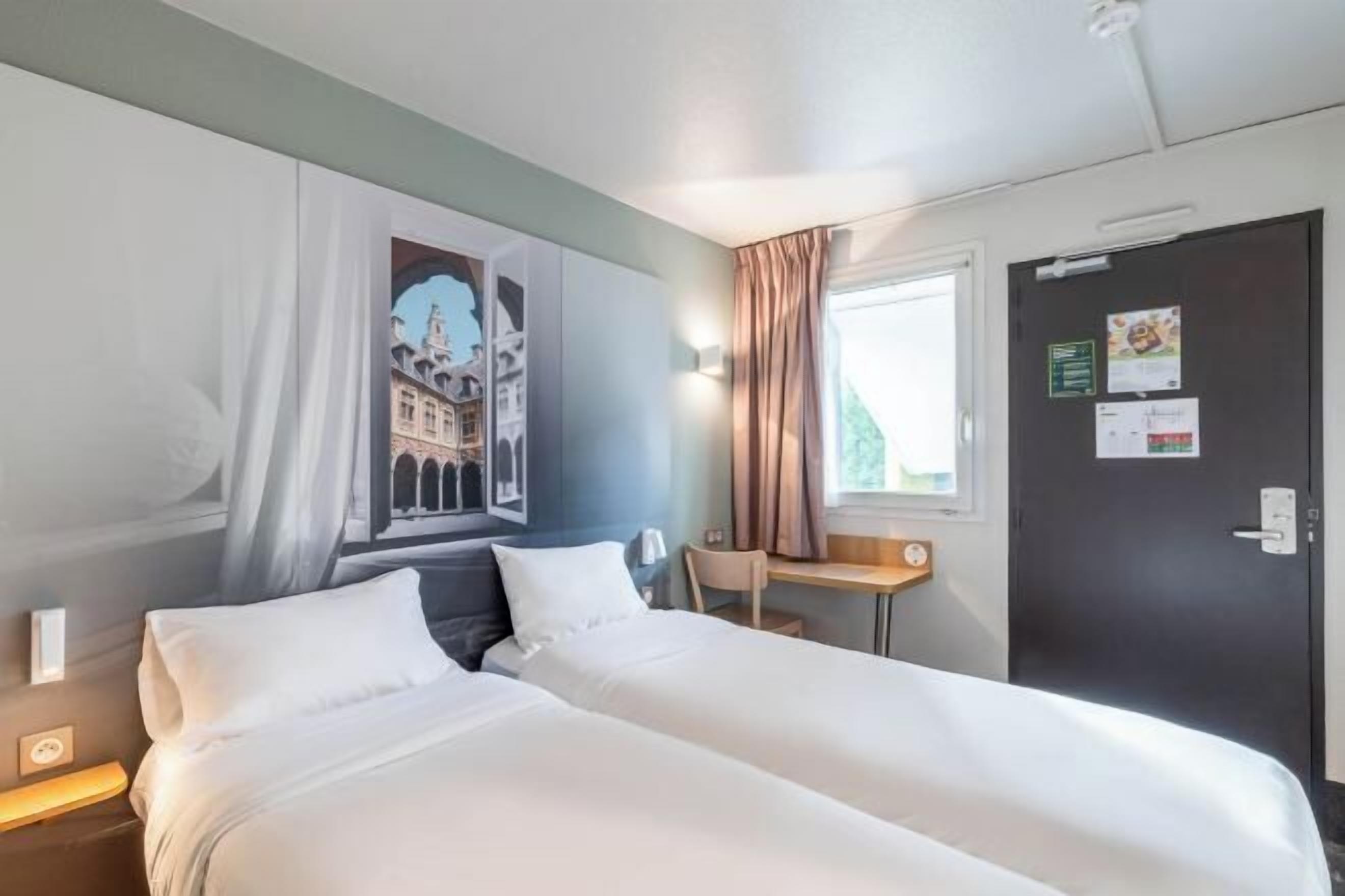 Premium bedding, down comforters, desk, soundproofing