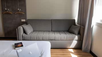 Desk, laptop workspace, blackout drapes, soundproofing