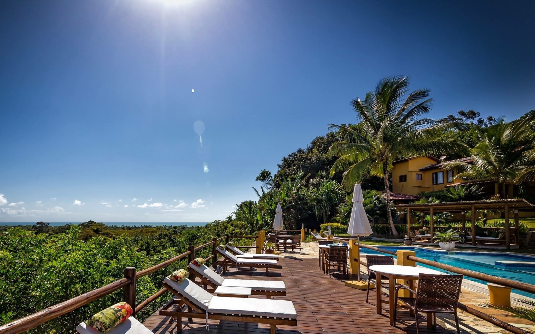 Outdoor pool, open 8:00 AM to 10:00 PM, pool umbrellas, pool loungers