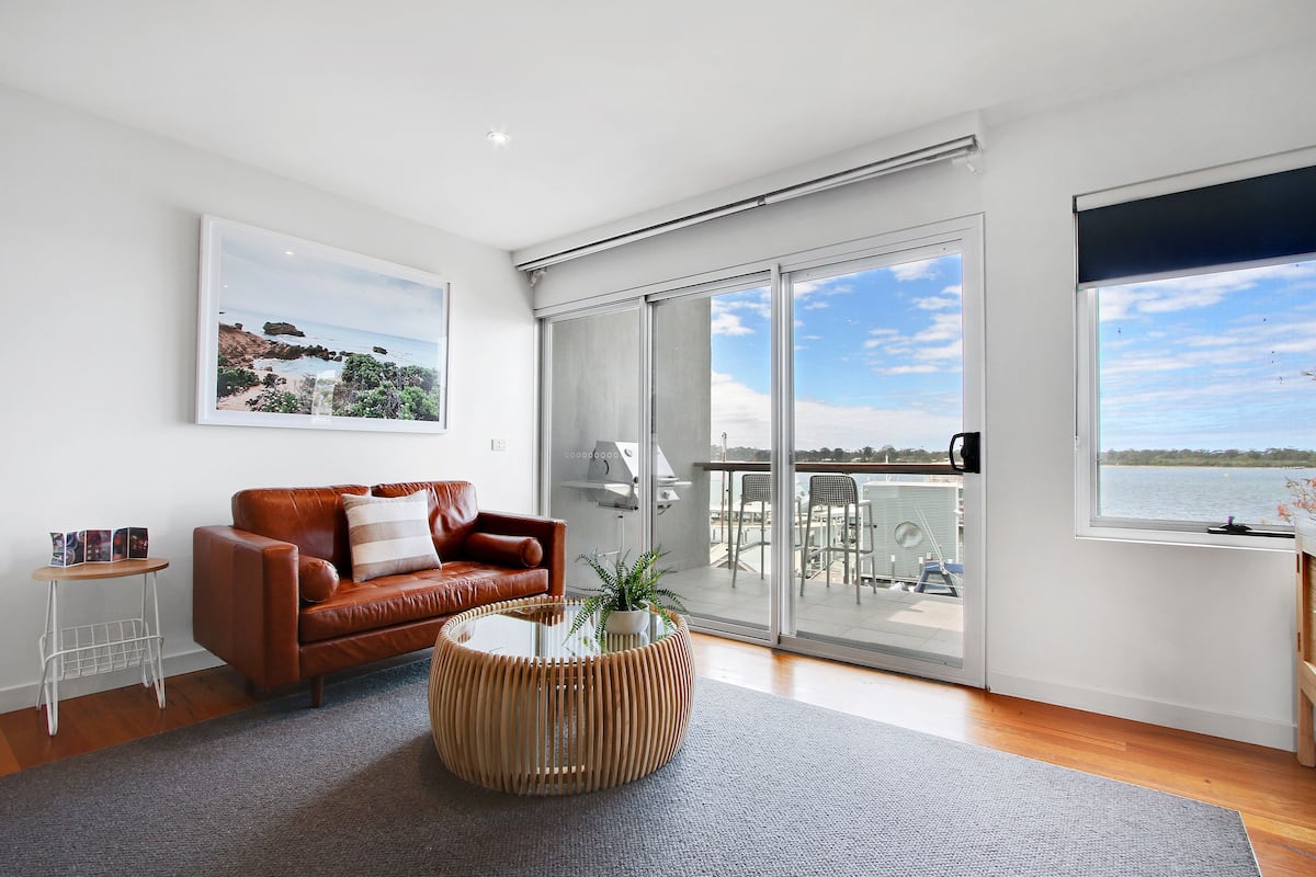 One Bedroom Spa Bay View Apartment | Living area | Flat-screen TV, DVD player