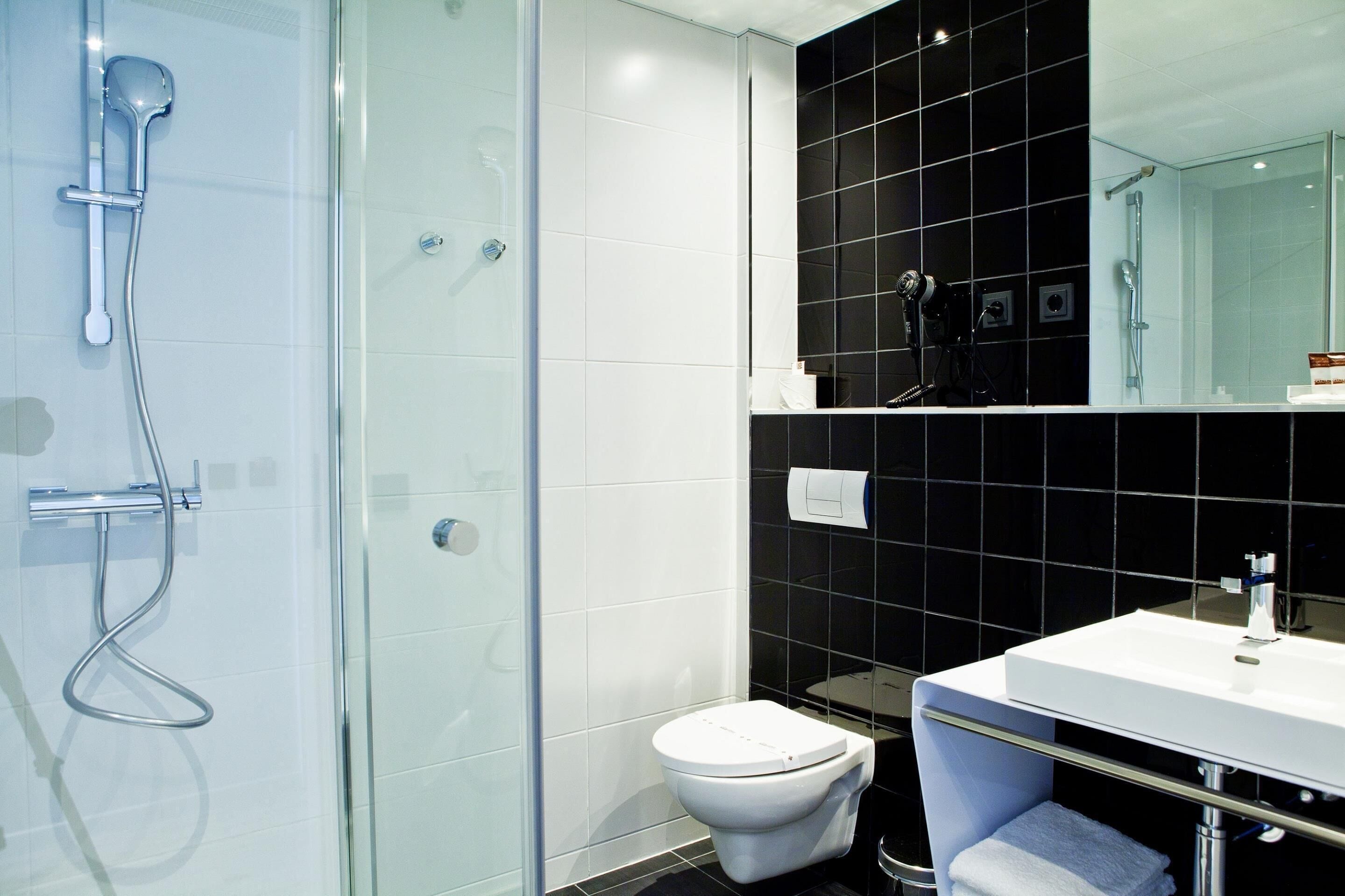 shower, eco-friendly toiletries, hair dryer, towels