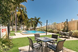 Outdoor pool, pool umbrellas, sun loungers