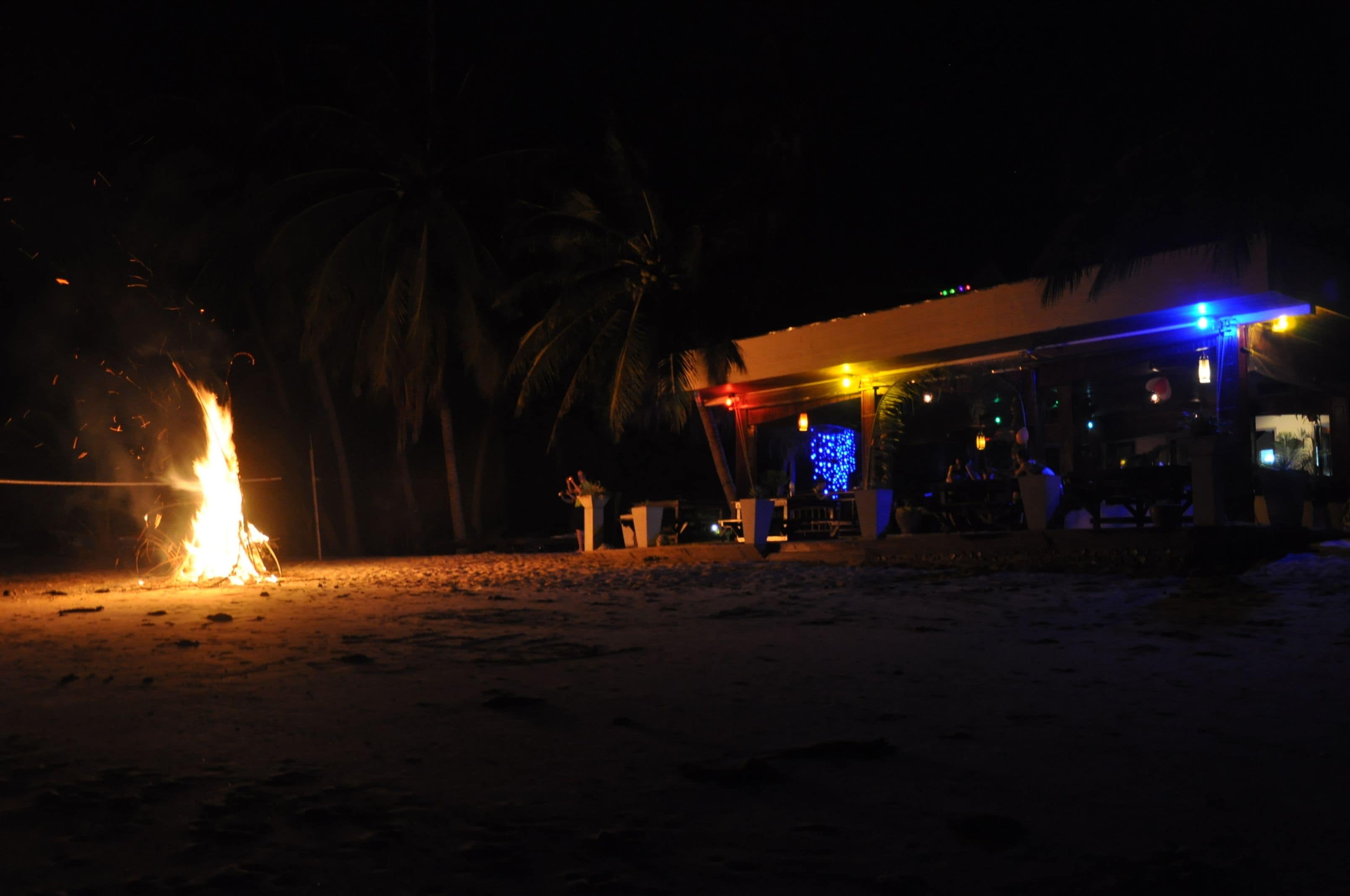 on the beach, white sand, sun-loungers, beach volleyball