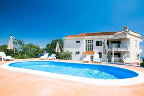 Outdoor pool, sun loungers